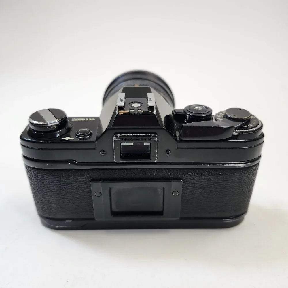 Canon AE-1 Black 35mm SLR Film Camera Sakar MC Zoom 1:3.5-4.5 f 28-80mm